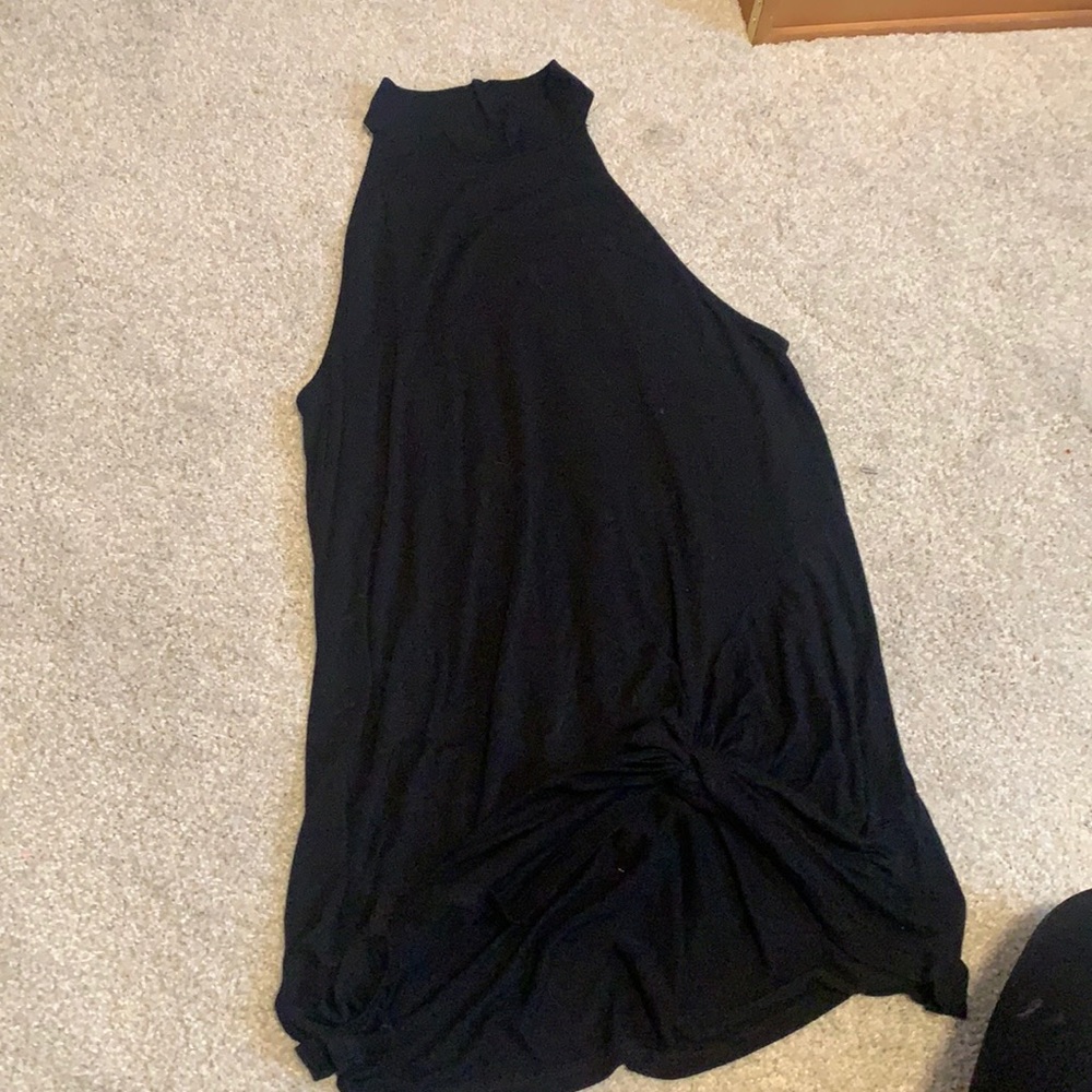black sleeveless turtleneck
